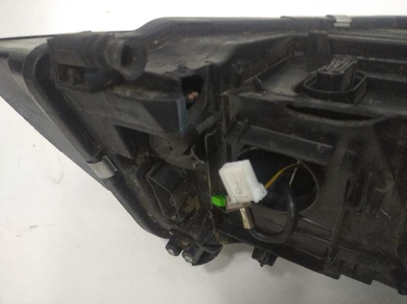 Faro izquierdo audi  no identificado