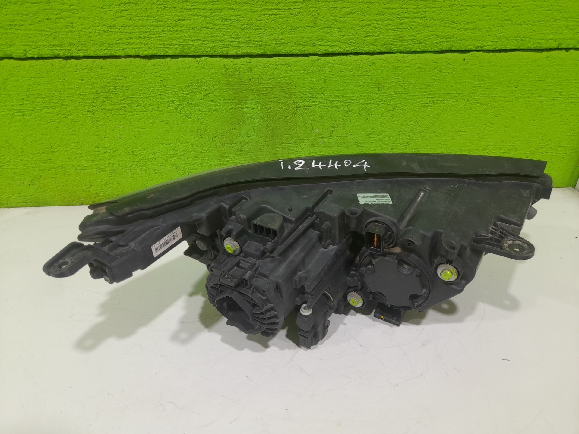 Faro izquierdo ssangyong xlv premium 4x2