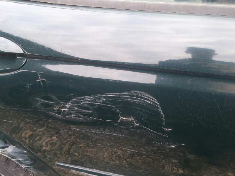 Puerta trasera derecha jaguar x-type 2.5 v6 a las 4 ruedas