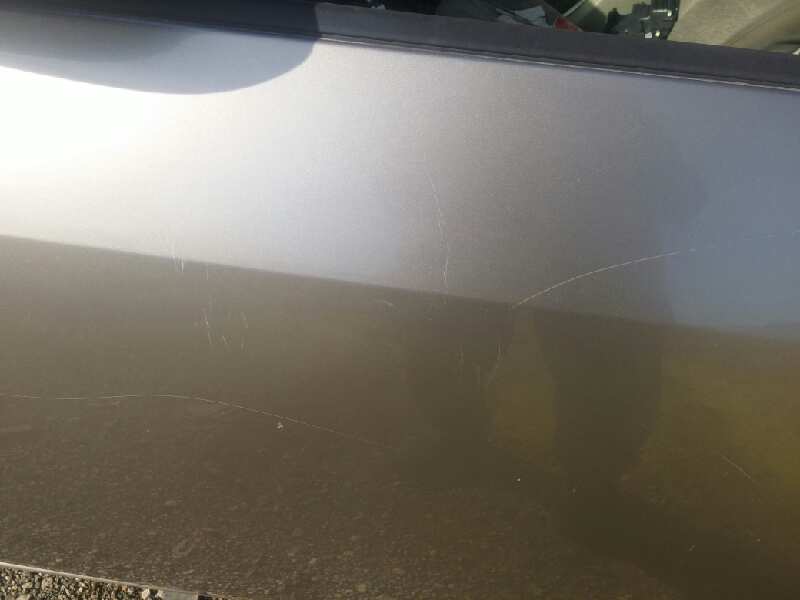 Puerta delantera izquierda nissan primera 2.0