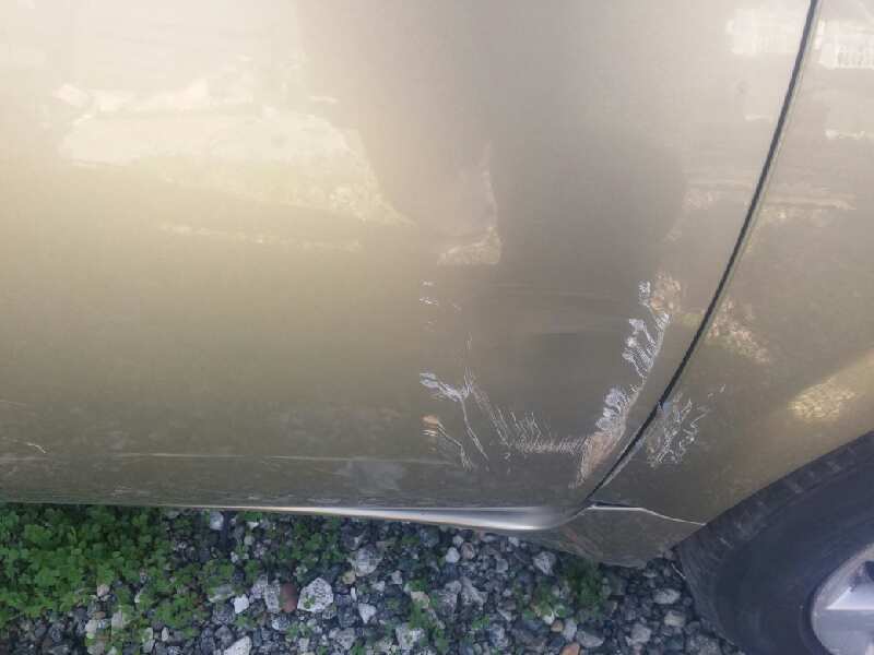 Puerta delantera derecha nissan primera 2.0