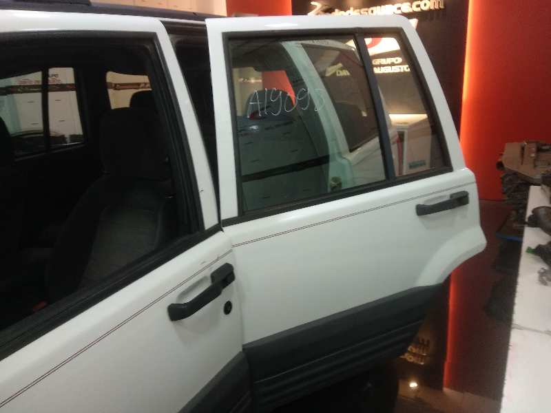 Puerta trasera izquierda jeep grand cherokee i 2.5 td 4x4 (z)