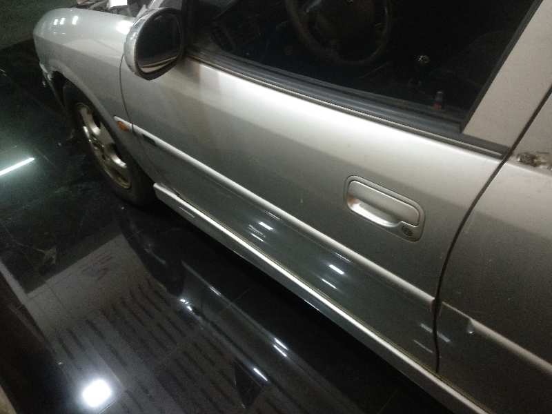 Bombin puerta delantera izquierda opel vectra b fastback 2.0 dti 16v (f68)