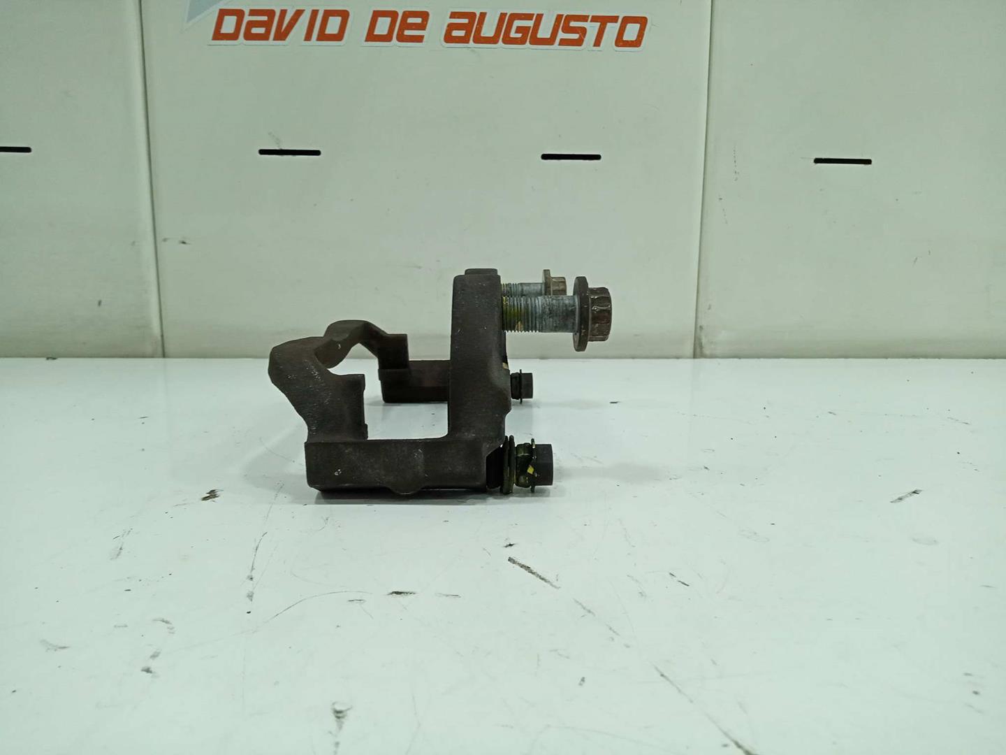 Soporte pinza freno delantero izquierdo kia sportage 1.6 gdi